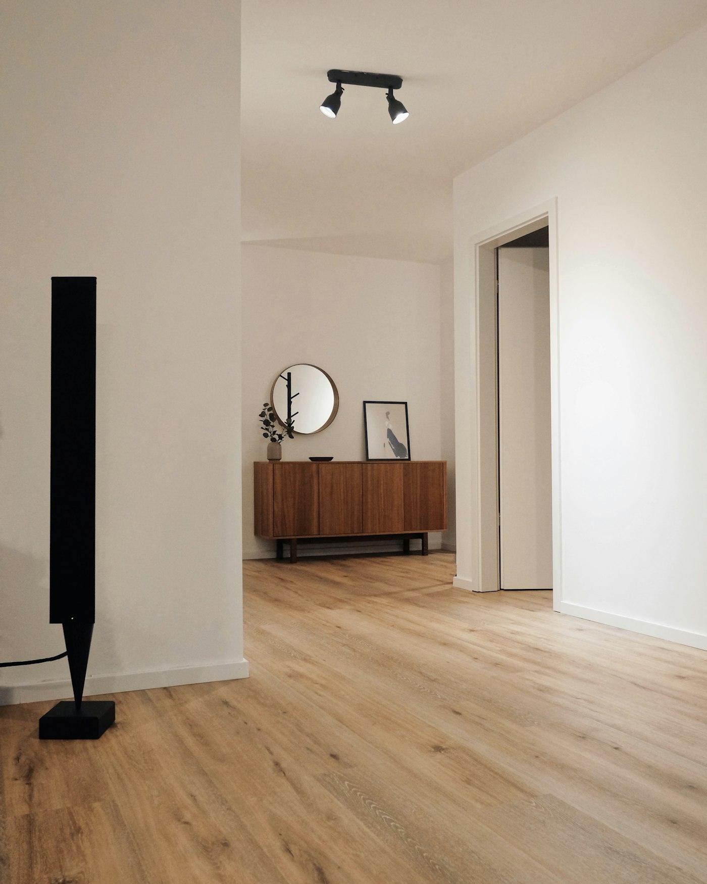 Entry hall with pale oak plank flooring